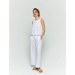 Pantaloni palazzo ricamato bianco vista anteriore indossato completo con il suo top