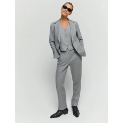 Pantaloni in cotone jersey jacquard grigio vista anteriore indossata con la sua giacca