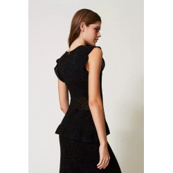 Top in maglia lurex nera vista posteriore indossata