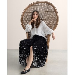 Gonna midi stampa pois nera con pois bianco vista anteriore indossata