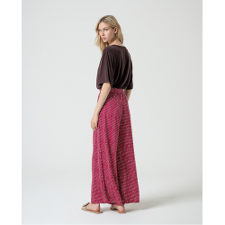 Pantaloni palazzo fantasia fucsia vista posteriore indossata