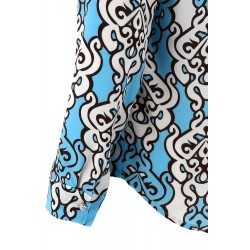 Camicia in viscosa fantasia turchese vista profilo primo piano sulla manica