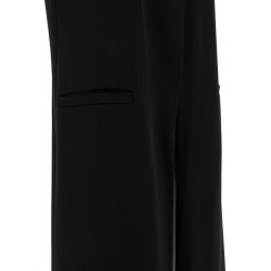 Maxi gilet lungo nero vista  primo piano della finta tasca